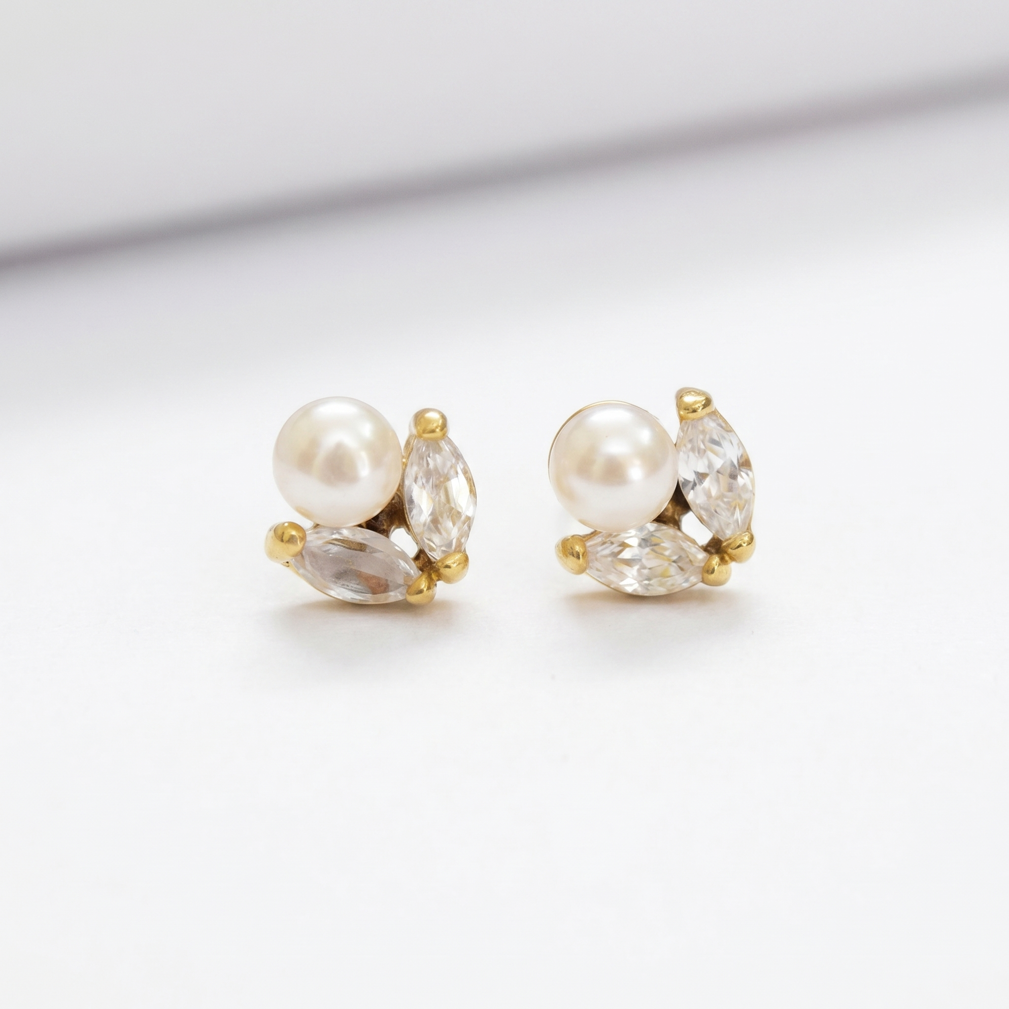 Cute Pearl Studs in leaf like Zircon Stones