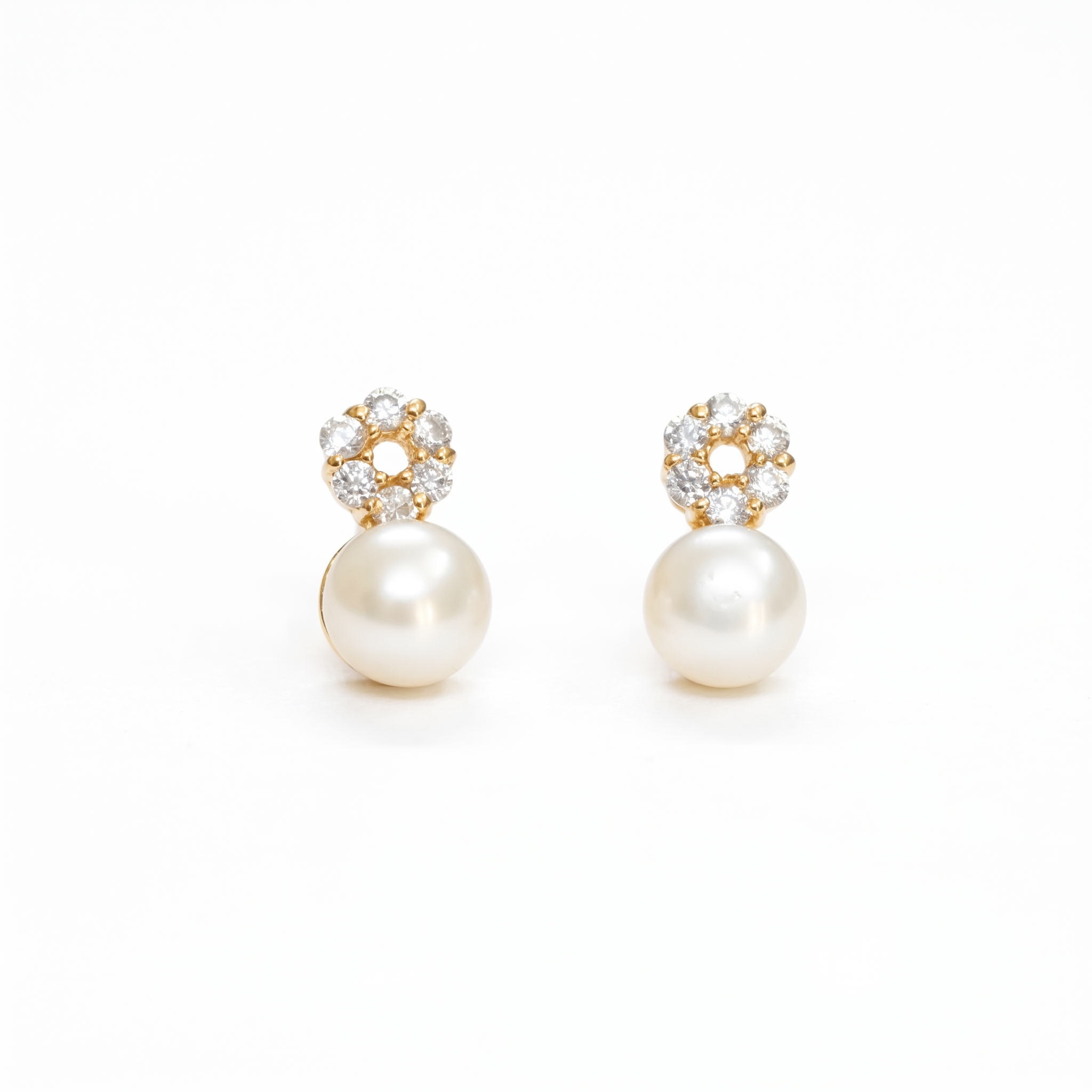 Stylish Pearl Studs in American Diamonds