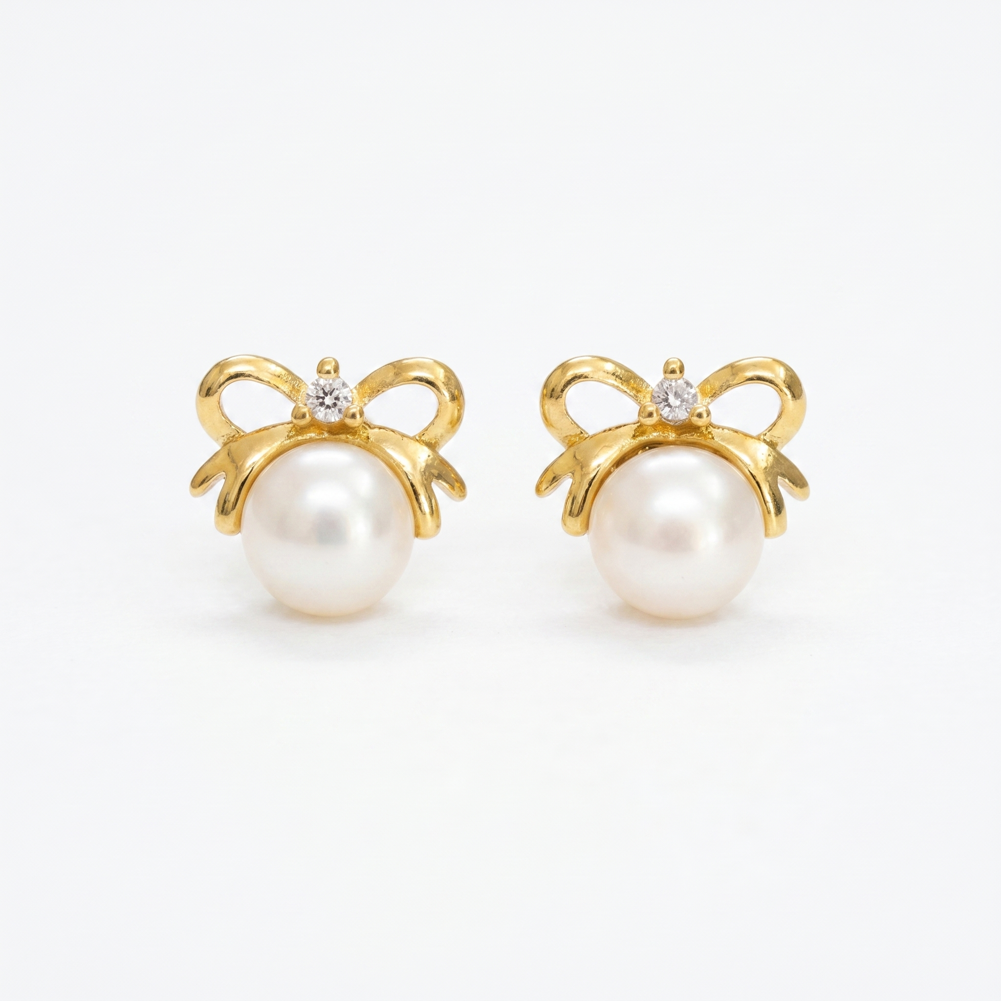 Pretty Butterfly Pearl Studs in Golden Colour Korean Metal