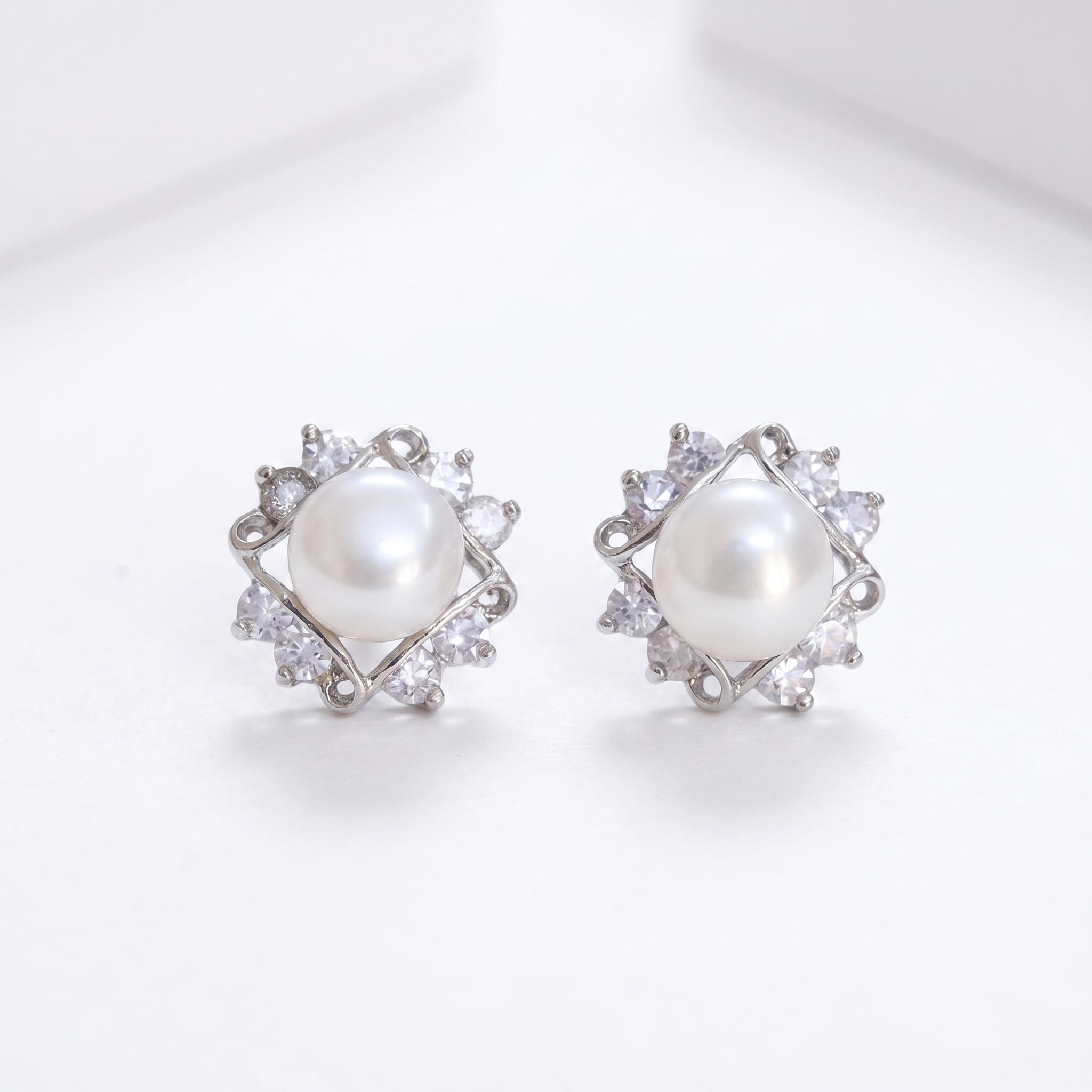 White pearl Studs with Beautiful American Diamonds