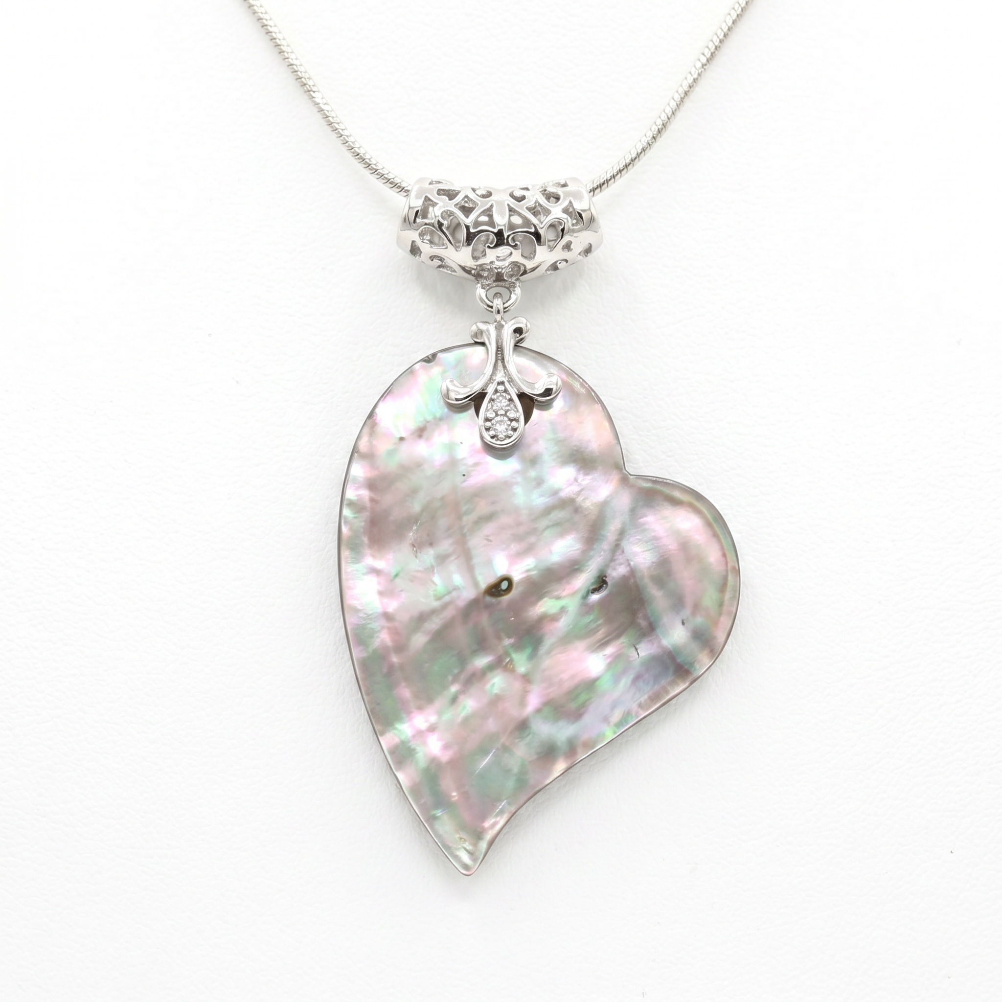 Unique Abalone Mother of Pearl Heart Shaped Pendant With A Filigree Clasp