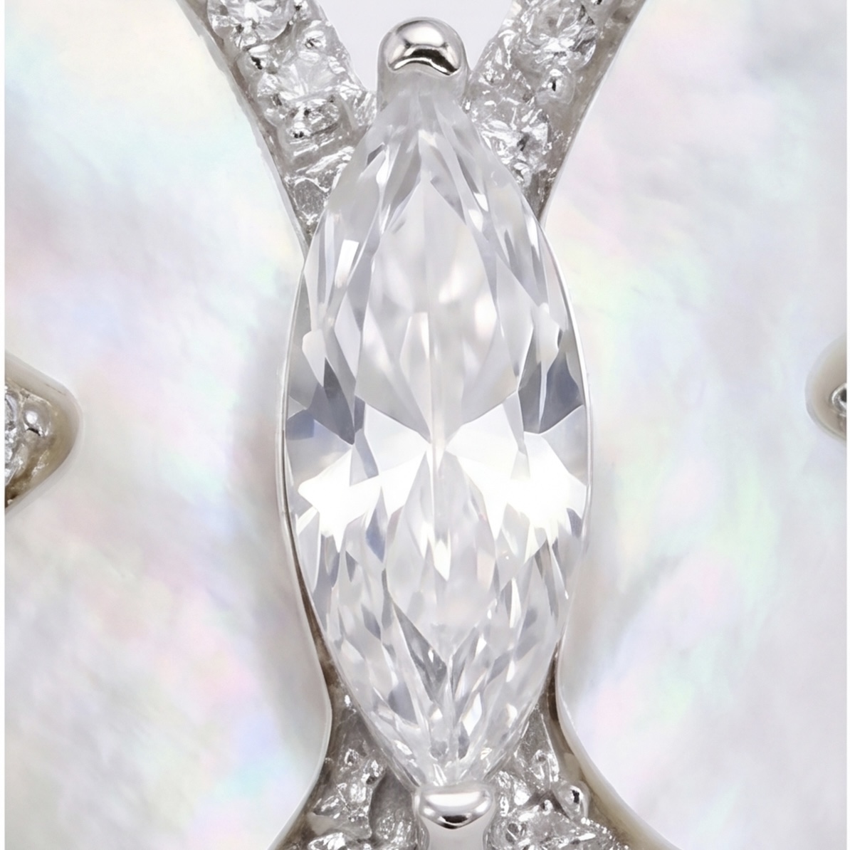 Close-up of the marquise American diamond (CZ) centre of the silver mother of pearl butterfly ring - Pure Pearls