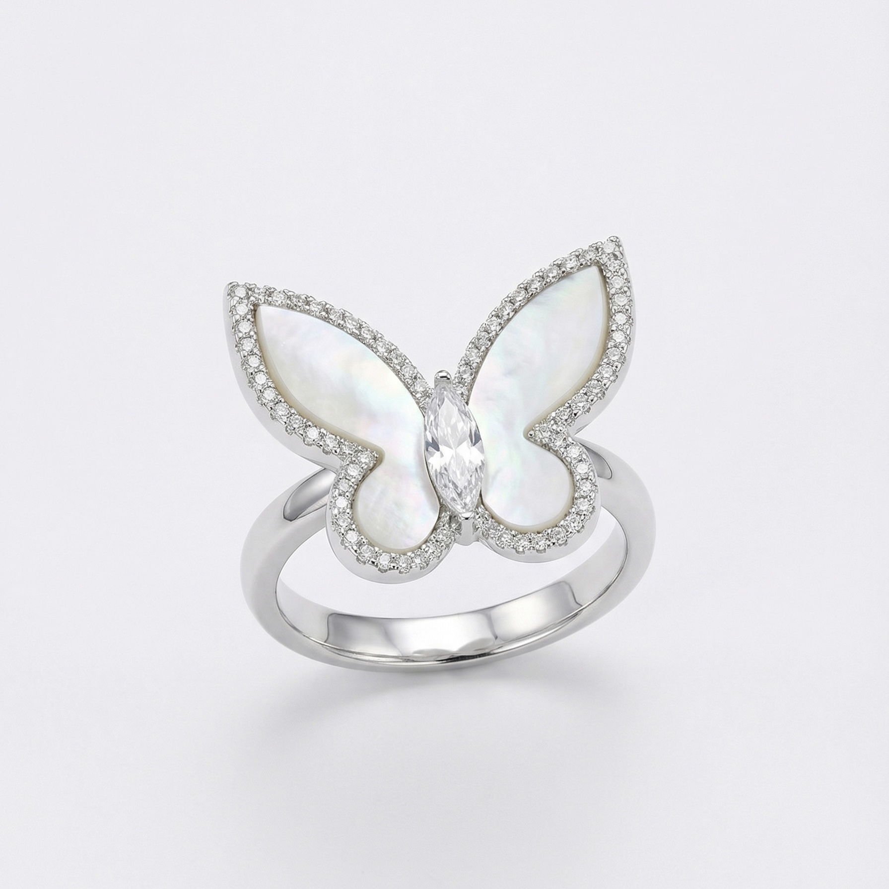 Silver-toned mother of pearl butterfly ring with American diamond accents and marquise centre stone - Pure Pearls