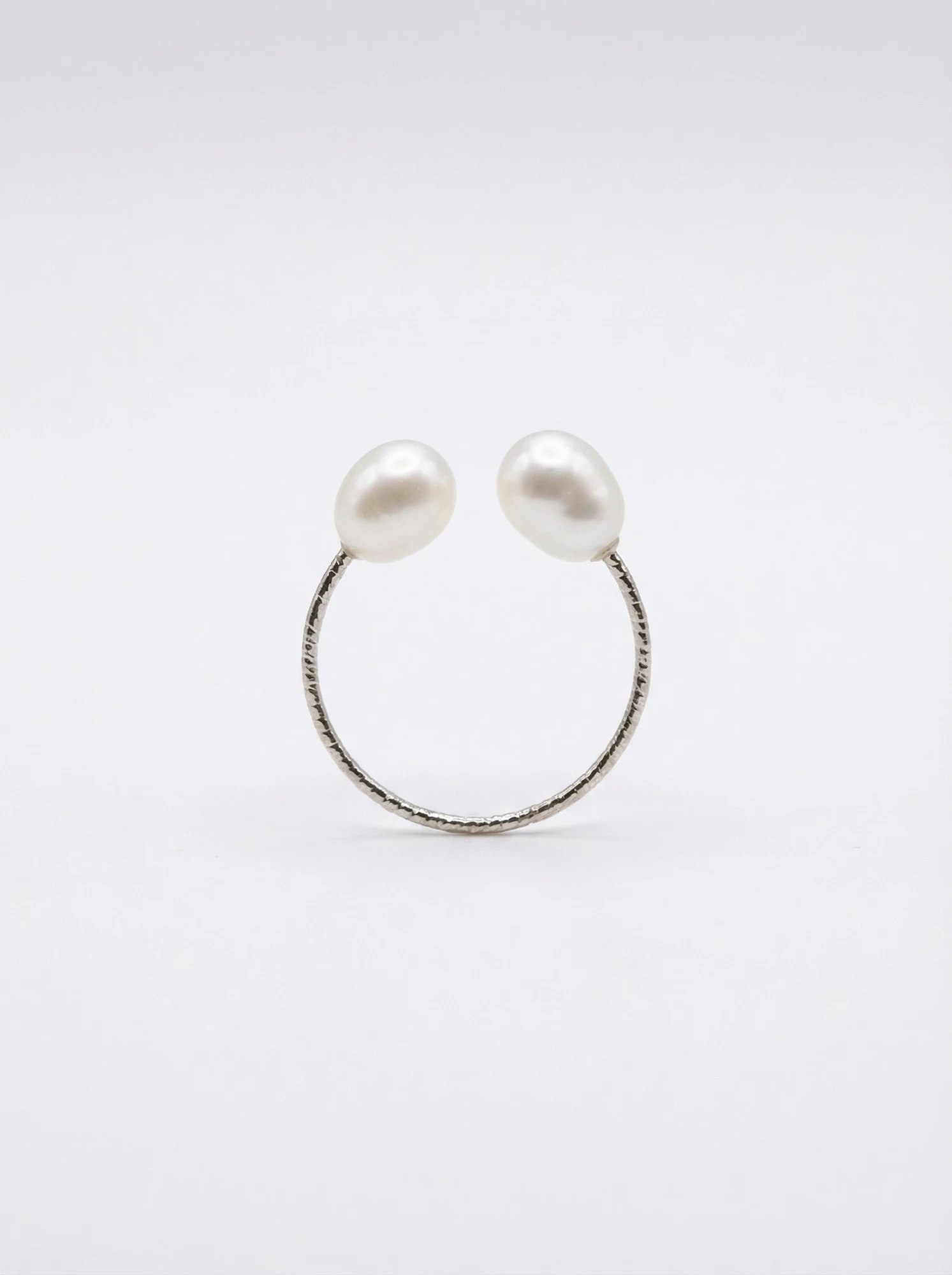Silver-toned open ring with two white freshwater pearls on a finely textured band - Pure Pearls