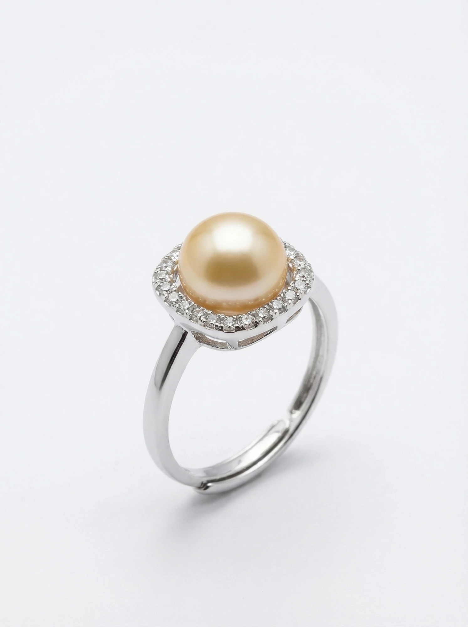Silver-toned adjustable ring with a peach freshwater pearl in a cushion halo of American diamonds (CZ) - Pure Pearls