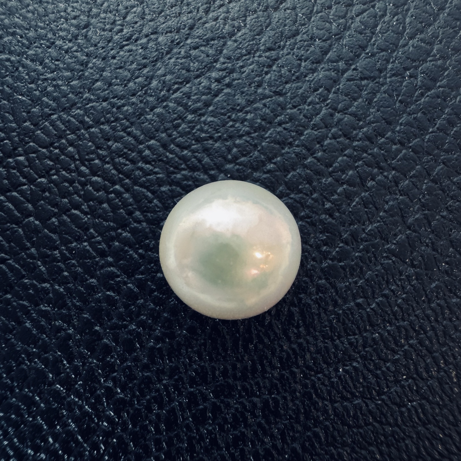 Second view of a 10mm white South Sea loose pearl showing lustre and surface - Pure Pearls