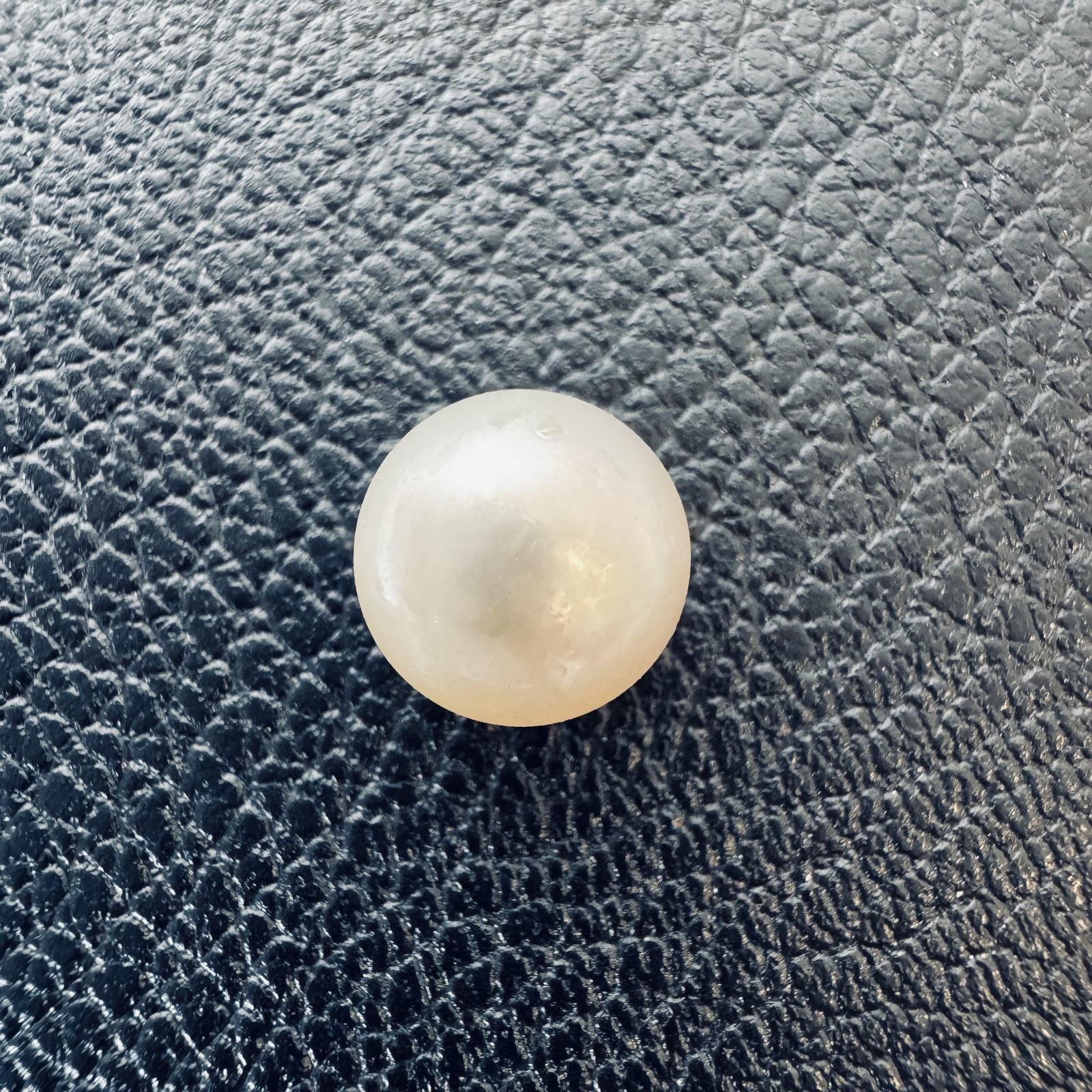 Second view of a 10.1mm white South Sea loose pearl showing lustre and surface - Pure Pearls